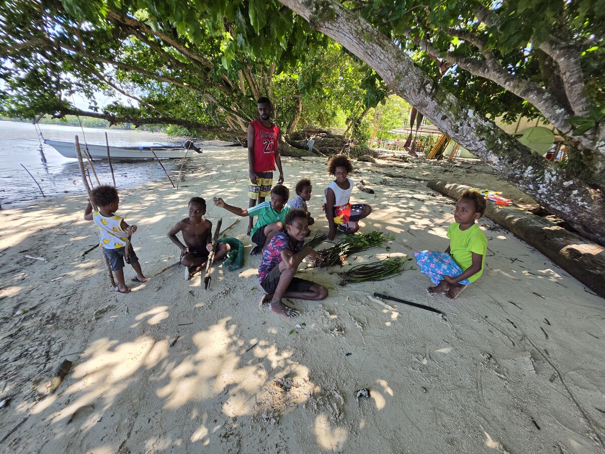 Youth planting mangrove seedlings